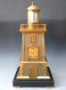 Guilmet lighthouse clock witth helical spring torsion pendulum, c. 1885.